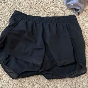 Athleta mesh racer running shorts, size medium color: black